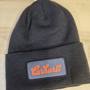 Carhartt/ Beanie/ Dark Gray with vibrant orange logo/NTW